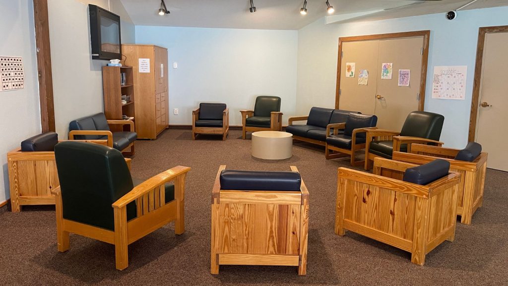 Chairs in a circle and television