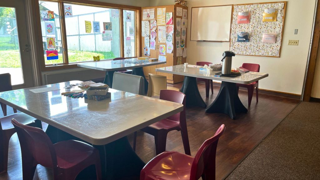 Tables, chairs and artwork